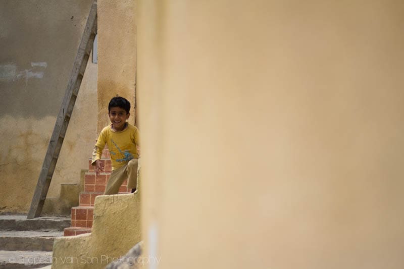 Boy playing in Oman Village