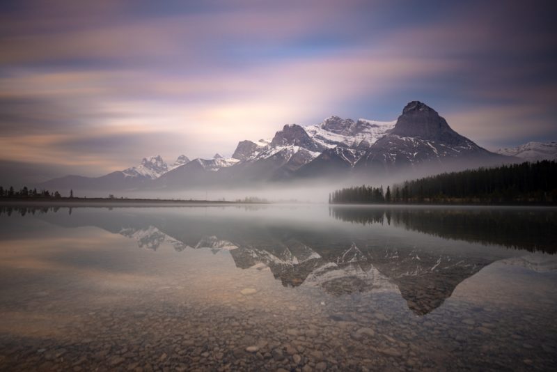 Reflections on a lake near the Nordic Center in Canmore, Canada.