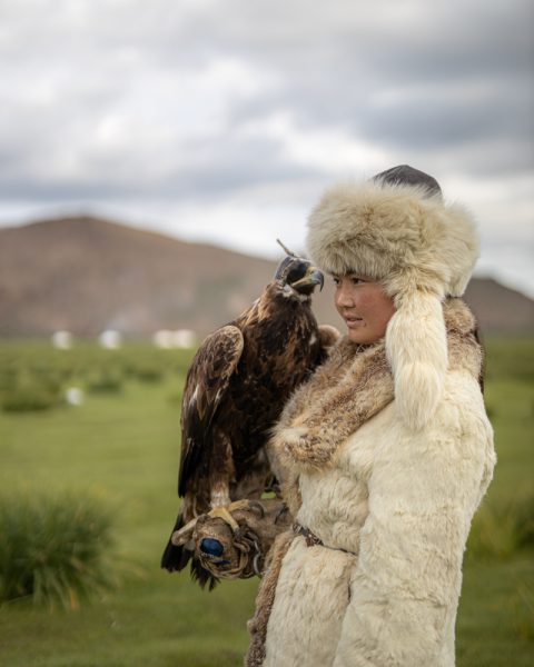 Aisholpan -the eagle huntress with her eagle