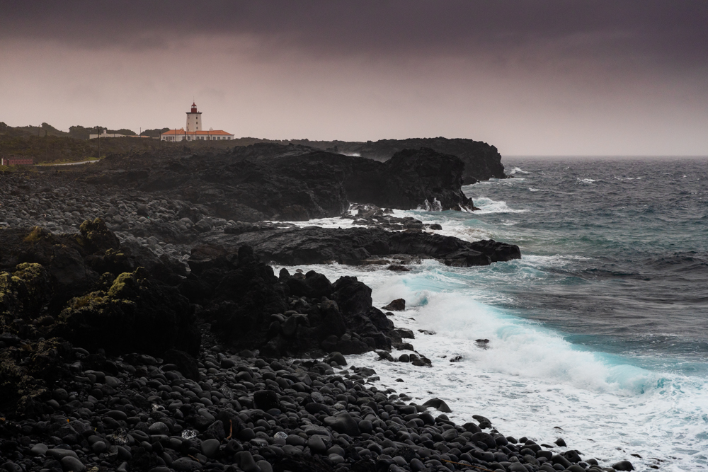 Farol da Ponta da Iha in the middle of a morning storm.